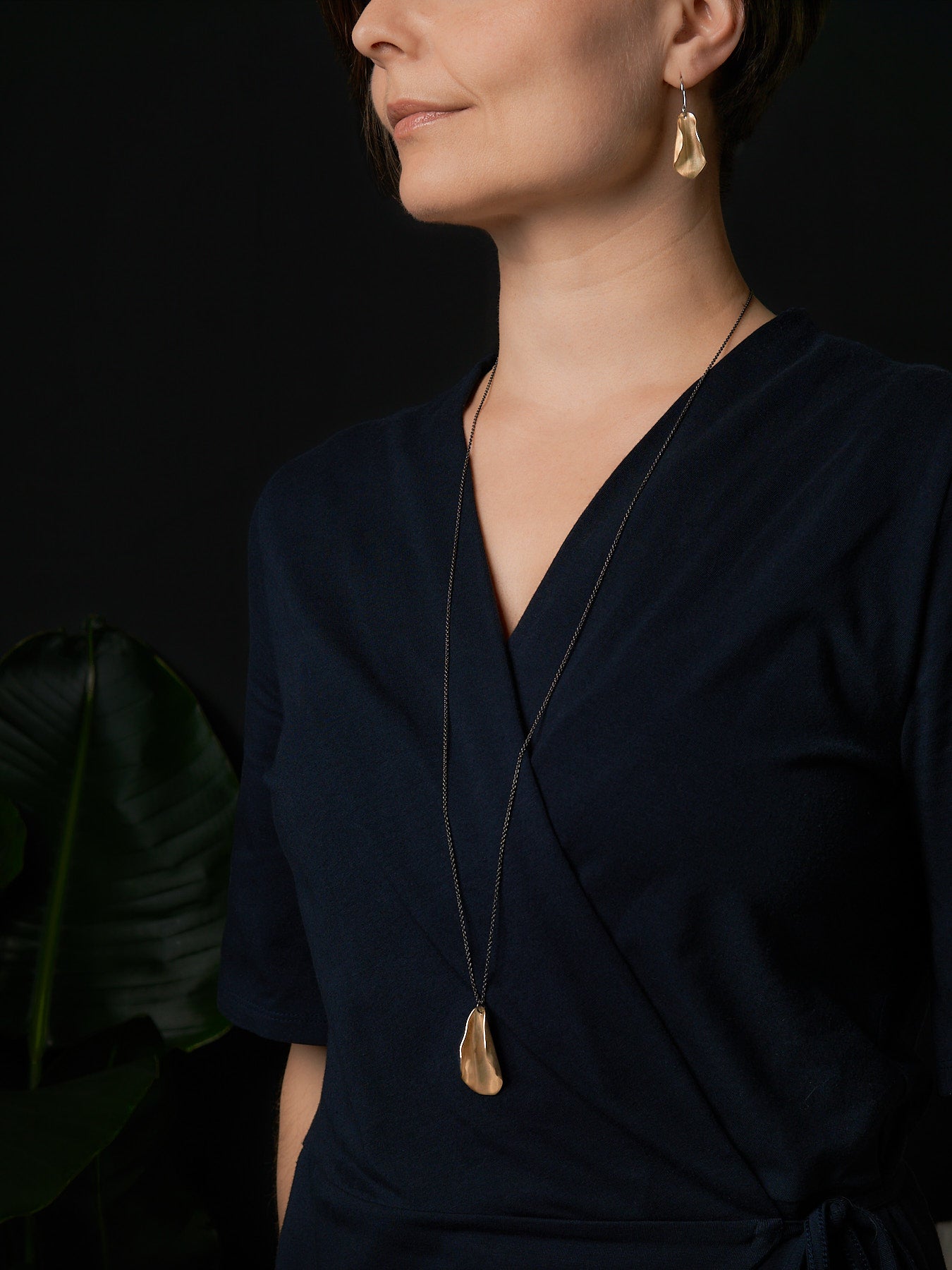 Magnolia statement necklace in brass